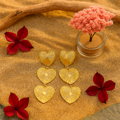 Serena Guilia Gouden hangoorbel 3 hartjes